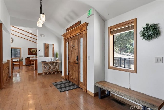 27363 Matterhorn Dr, Lake Arrowhead, CA 92352 - foyer entrance featuring wood-type flooring, lofted ceiling, visible vents, and recessed lighting