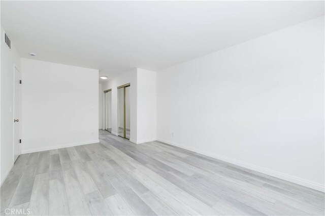 120 S Sierra Madre Blvd Unit 206, Pasadena, CA 91107 - spare room featuring light wood-style floors and baseboards