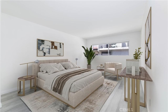 120 S Sierra Madre Blvd Unit 206, Pasadena, CA 91107 - bedroom with wood finished floors and baseboards