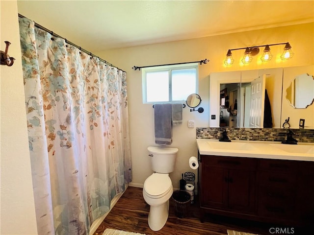 921 Piru Way, Frazier Park, CA 93225 - full bathroom with toilet, vanity, wood finished floors, tasteful backsplash, and curtained shower