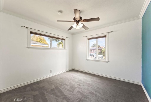 spare room featuring crown molding, ceiling fan, carpet, and baseboards