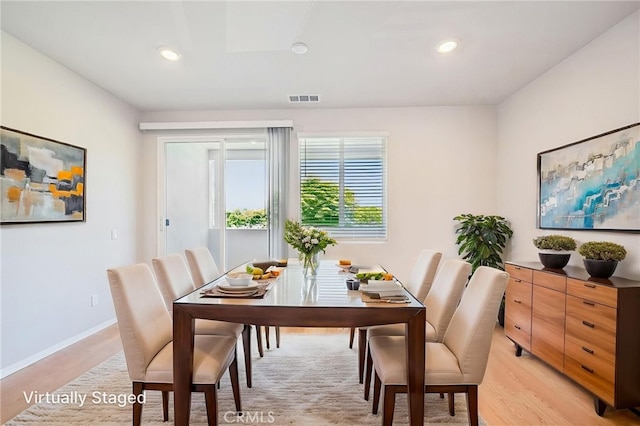 219 Aurora Ln, Pomona, CA 91767 - dining room with light wood-style floors, recessed lighting, and baseboards