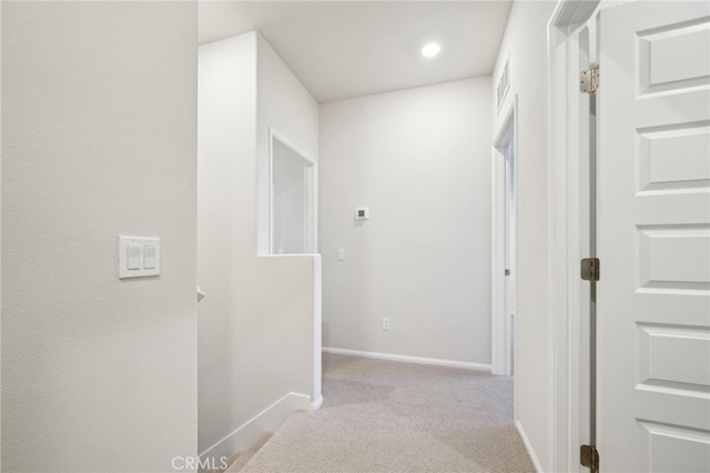 219 Aurora Ln, Pomona, CA 91767 - corridor featuring carpet floors and baseboards