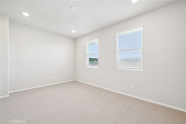 219 Aurora Ln, Pomona, CA 91767 - carpeted spare room with baseboards and recessed lighting