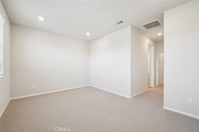 219 Aurora Ln, Pomona, CA 91767 - carpeted empty room with recessed lighting and baseboards