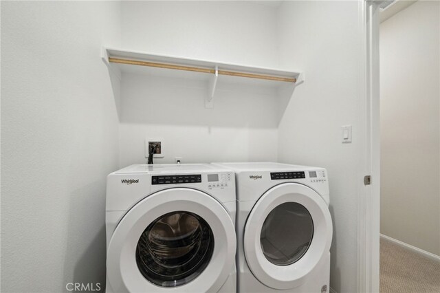 219 Aurora Ln, Pomona, CA 91767 - laundry area featuring independent washer and dryer, carpet, and baseboards