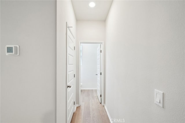 219 Aurora Ln, Pomona, CA 91767 - hall with light wood-style floors, baseboards, and recessed lighting