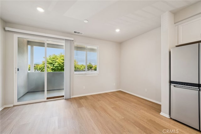 219 Aurora Ln, Pomona, CA 91767 - empty room with light wood-type flooring, baseboards, and recessed lighting