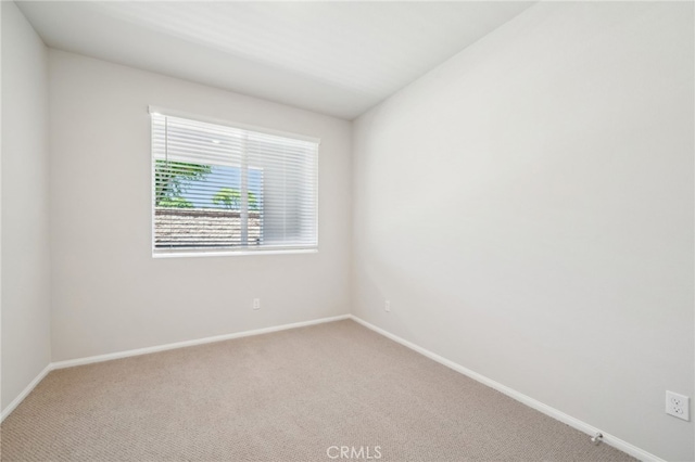219 Aurora Ln, Pomona, CA 91767 - unfurnished room with carpet and baseboards