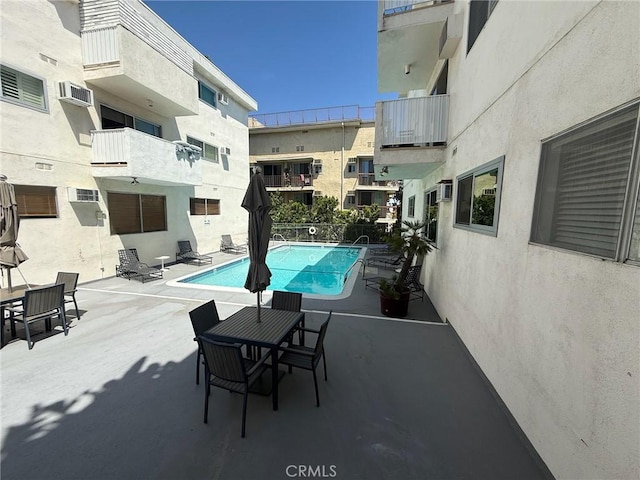 960 Larrabee St Unit 120, West Hollywood, CA 90069 - community pool with a wall mounted air conditioner and a patio