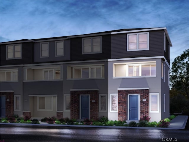 217 Aurora Ln, Pomona, CA 91767 - view of property with brick siding and stucco siding