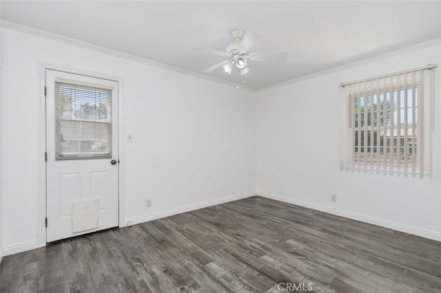 empty room with wood finished floors, crown molding, and ceiling fan