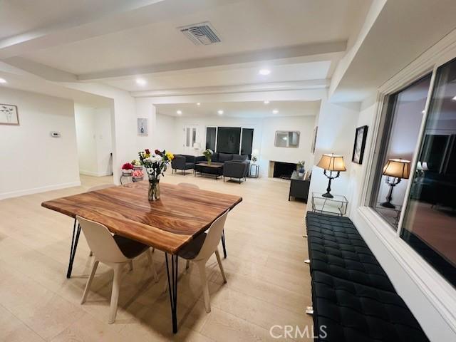 dining area with beamed ceiling, recessed lighting, visible vents, and baseboards