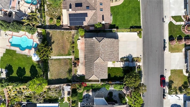 drone / aerial view of a pool area