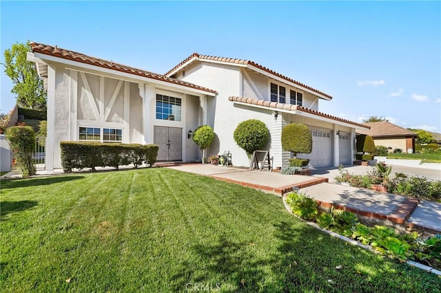 view of front of home featuring stucco siding, a tiled roof, driveway, a front yard, and a garage