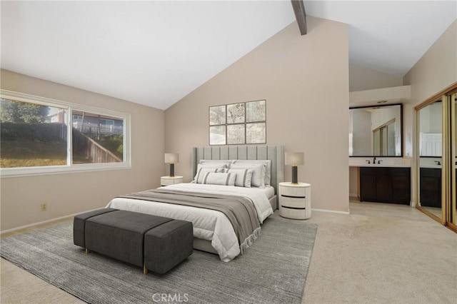 bedroom featuring carpet flooring, baseboards, and a sink