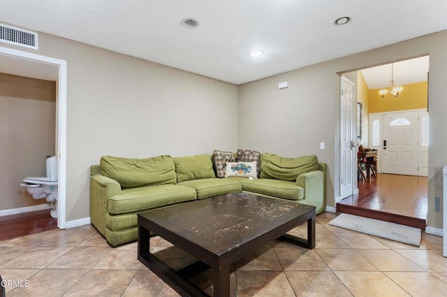 1421 E Abbottson St, Carson, CA 90746 - living area featuring light tile patterned floors, a chandelier, recessed lighting, and baseboards