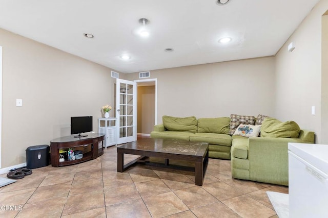 1421 E Abbottson St, Carson, CA 90746 - living area with light tile patterned floors, recessed lighting, and baseboards