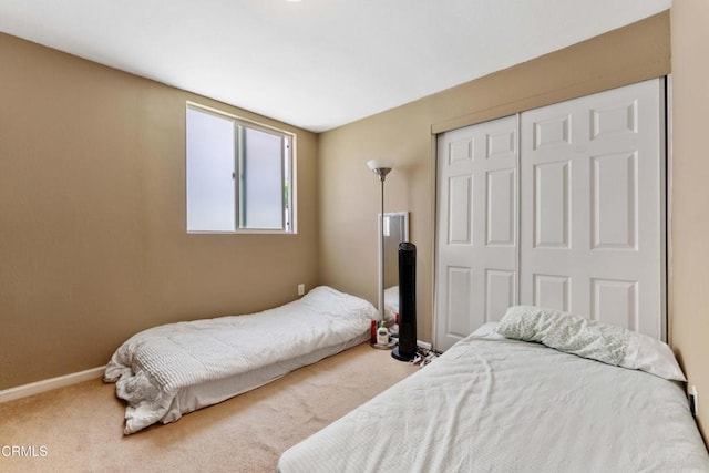 1421 E Abbottson St, Carson, CA 90746 - bedroom with a closet, baseboards, and carpet floors