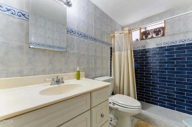 1421 E Abbottson St, Carson, CA 90746 - bathroom with tile walls, tiled shower, and vanity
