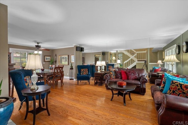 1943 Belmore Ct, El Cajon, CA 92020 - living area with crown molding, a ceiling fan, stairs, and wood finished floors