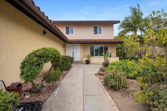1943 Belmore Ct, El Cajon, CA 92020 - entrance to property featuring stucco siding and a tile roof