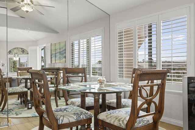 5270 W Wooley Rd, Oxnard, CA 93035 - dining room featuring wood finished floors, a ceiling fan, and vaulted ceiling