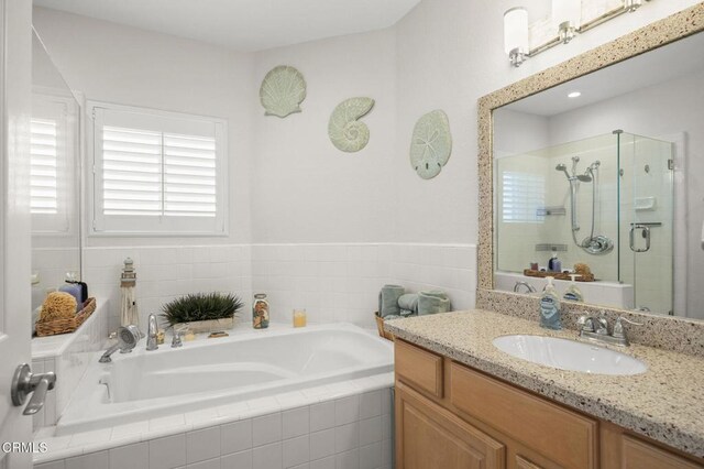 5270 W Wooley Rd, Oxnard, CA 93035 - bathroom featuring a bath, a shower stall, and vanity