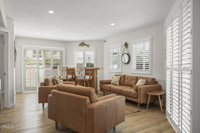 5270 W Wooley Rd, Oxnard, CA 93035 - living area featuring light wood finished floors and recessed lighting