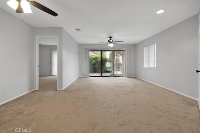 unfurnished living room featuring light carpet, baseboards, visible vents, recessed lighting, and ceiling fan
