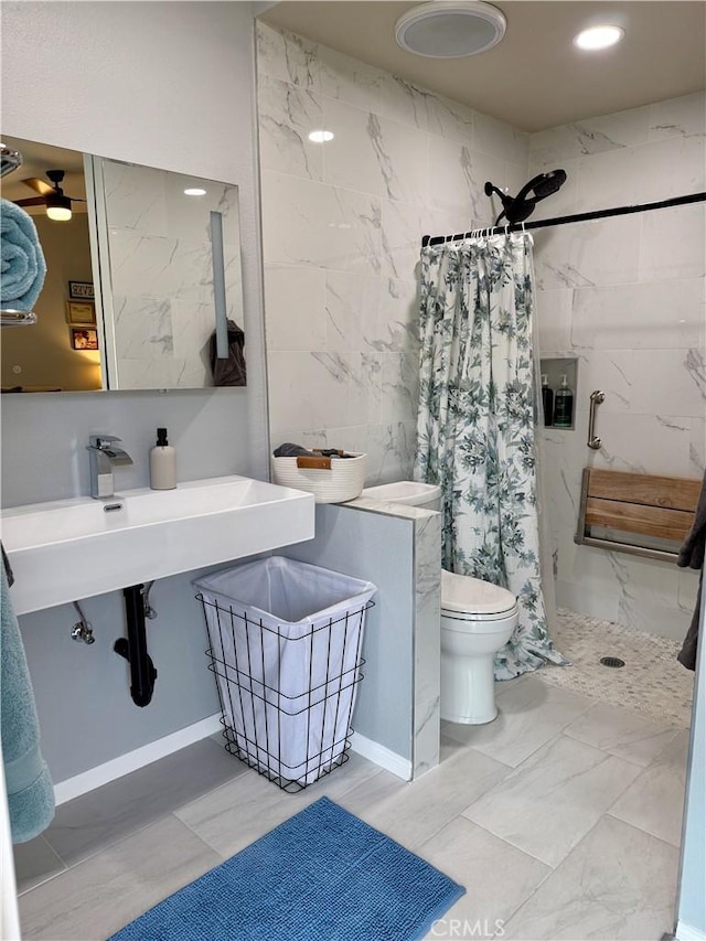 2579 Oak Springs Pl, Ontario, CA 91761 - full bath featuring a shower stall, toilet, marble finish flooring, and a sink