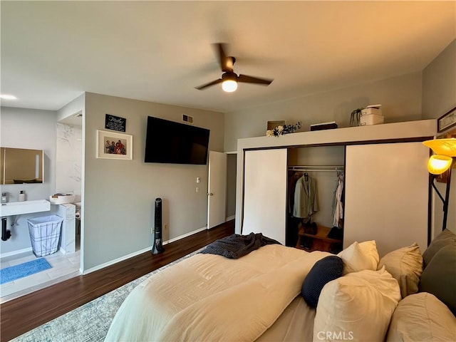 2579 Oak Springs Pl, Ontario, CA 91761 - bedroom featuring a closet, wood finished floors, baseboards, and a ceiling fan