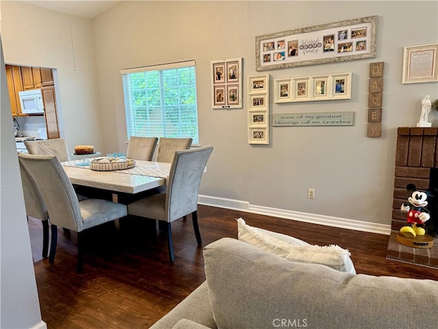 2579 Oak Springs Pl, Ontario, CA 91761 - dining room featuring dark wood-style flooring and baseboards