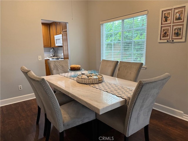 2579 Oak Springs Pl, Ontario, CA 91761 - dining space featuring baseboards and dark wood-type flooring