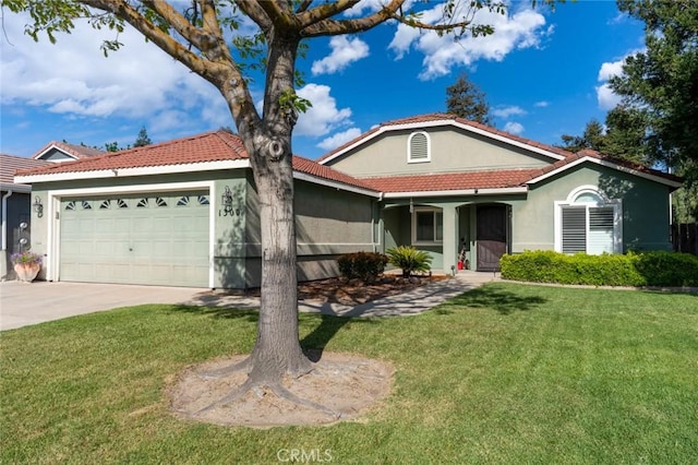 mediterranean / spanish house featuring a front lawn, an attached garage, concrete driveway, and stucco siding