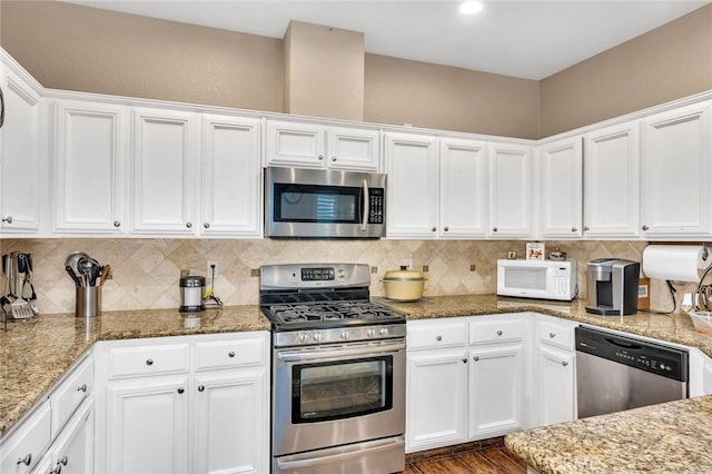 kitchen featuring white cabinetry and stainless steel appliances