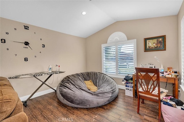sitting room with lofted ceiling, baseboards, wood finished floors, and recessed lighting