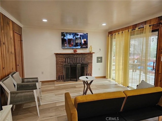 32868 Deer Ln, Running Springs, CA 92382 - living room featuring light wood finished floors, crown molding, a brick fireplace, and recessed lighting