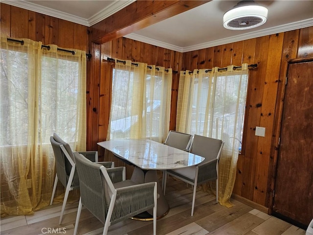 32868 Deer Ln, Running Springs, CA 92382 - dining space with crown molding, wood walls, and wood finished floors