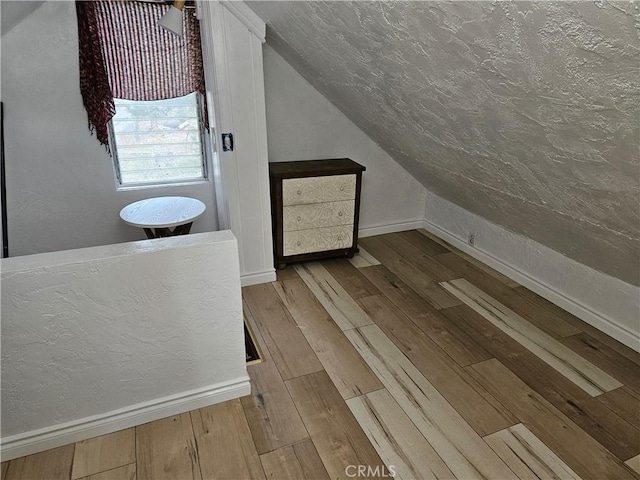 32868 Deer Ln, Running Springs, CA 92382 - additional living space featuring lofted ceiling and hardwood / wood-style floors