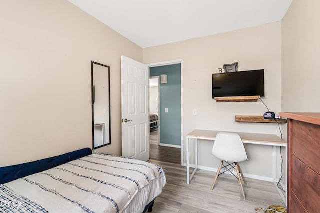 232 Prospect St, Oak View, CA 93022 - bedroom featuring wood finished floors, baseboards, and a desk