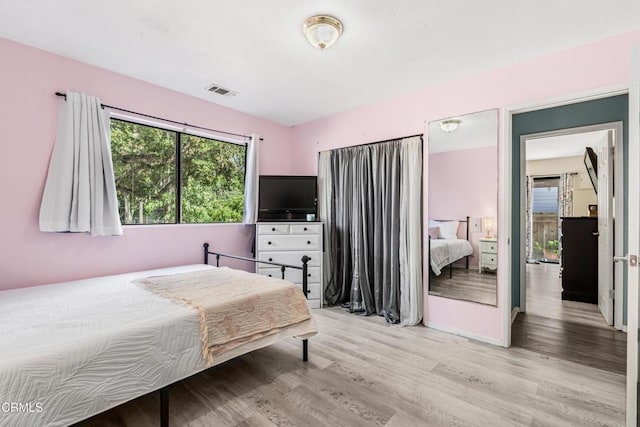 232 Prospect St, Oak View, CA 93022 - bedroom with multiple windows and light wood-type flooring