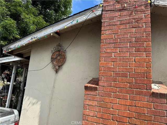 1017 N Alice Ave, Rialto, CA 92376 - exterior view of stucco siding and brick siding