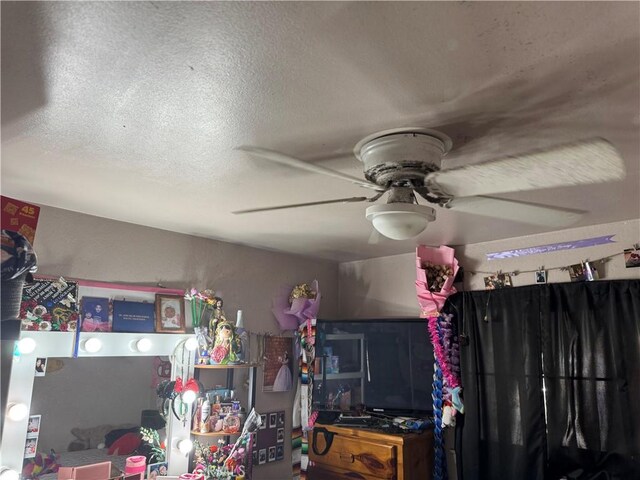 1017 N Alice Ave, Rialto, CA 92376 - bedroom featuring a textured ceiling and ceiling fan
