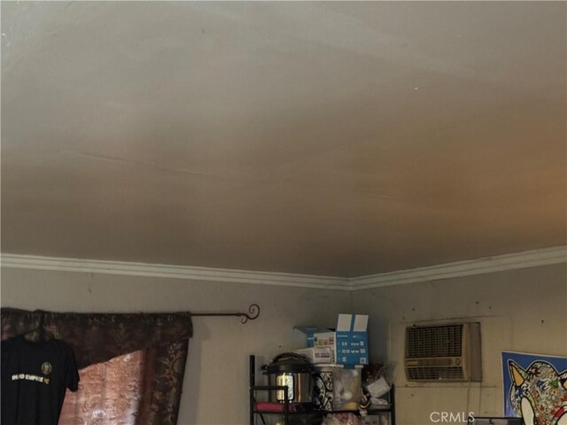 1017 N Alice Ave, Rialto, CA 92376 - detailed view of crown molding and a wall mounted AC