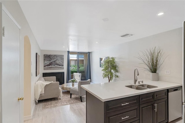 740 N Kings Rd Unit 225, West Hollywood, CA 90069 - kitchen with a sink, dishwasher, light countertops, recessed lighting, and open floor plan