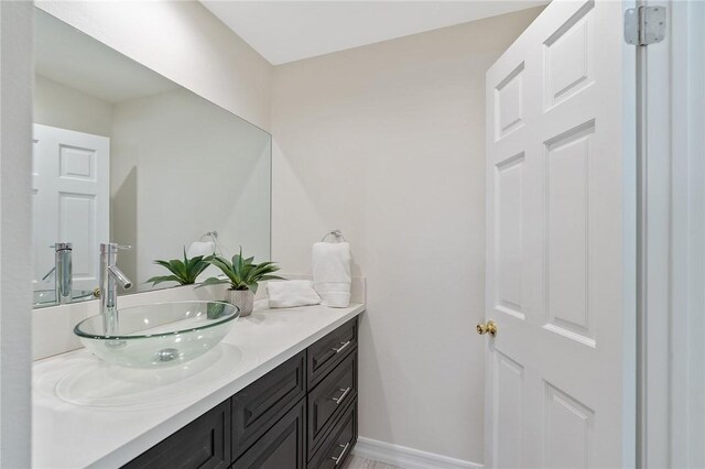 740 N Kings Rd Unit 225, West Hollywood, CA 90069 - bathroom with vanity and baseboards