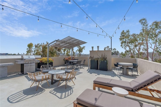 740 N Kings Rd Unit 225, West Hollywood, CA 90069 - view of patio / terrace featuring outdoor dining area, a grill, and a pergola