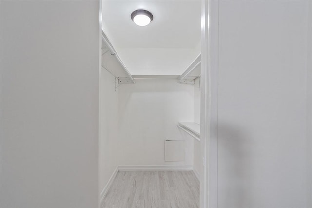 740 N Kings Rd Unit 225, West Hollywood, CA 90069 - spacious closet featuring light wood finished floors