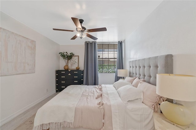 740 N Kings Rd Unit 225, West Hollywood, CA 90069 - bedroom featuring wood finished floors, baseboards, and ceiling fan